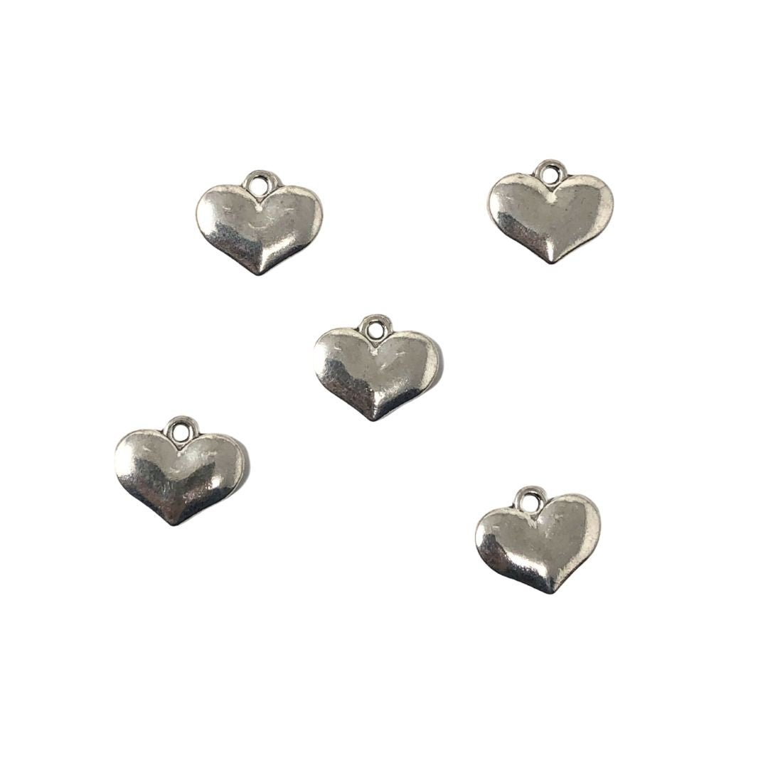 Dijes metalicos de corazon