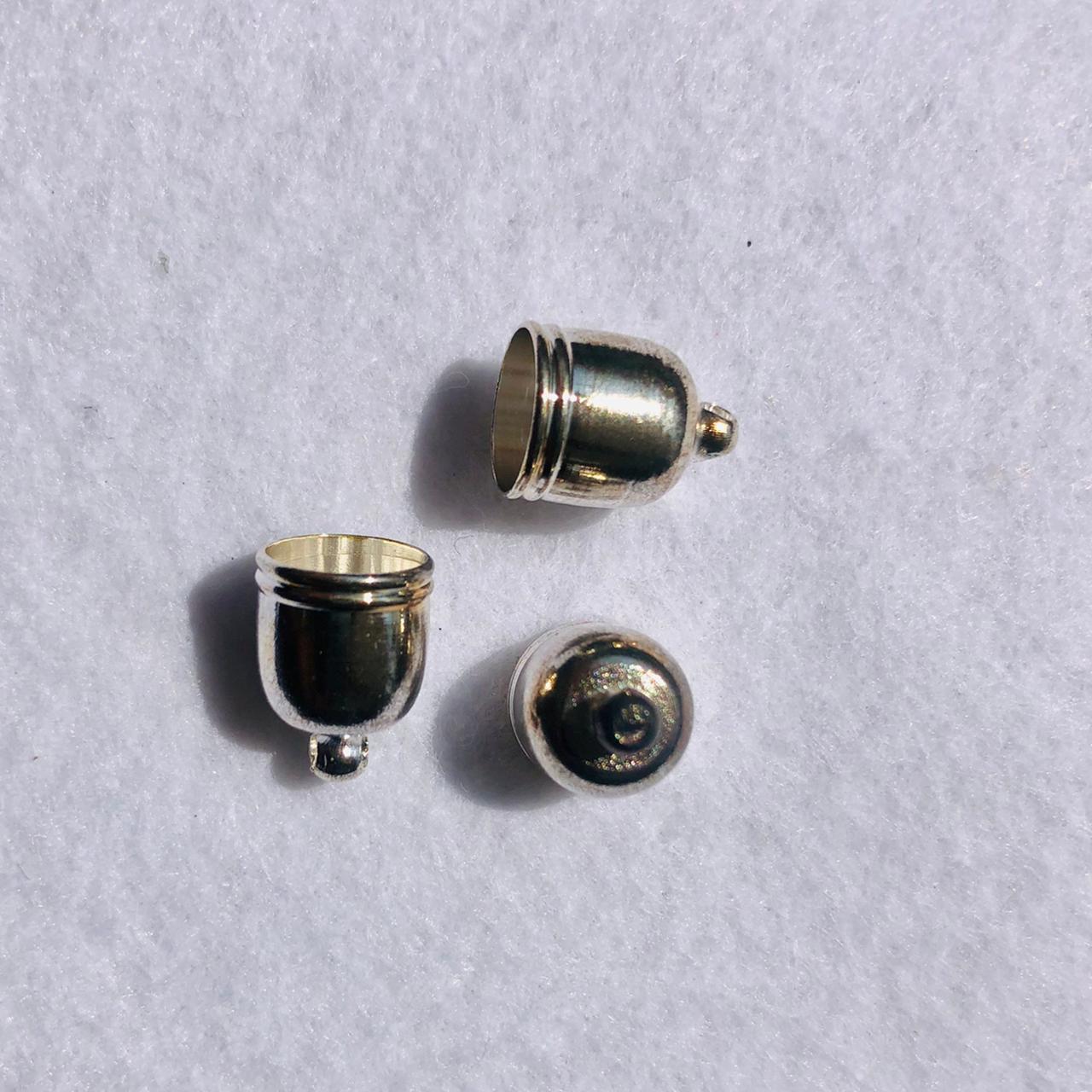(TRM0004) Tapa Borla Oval con raya 10 mm color oro 25 pz