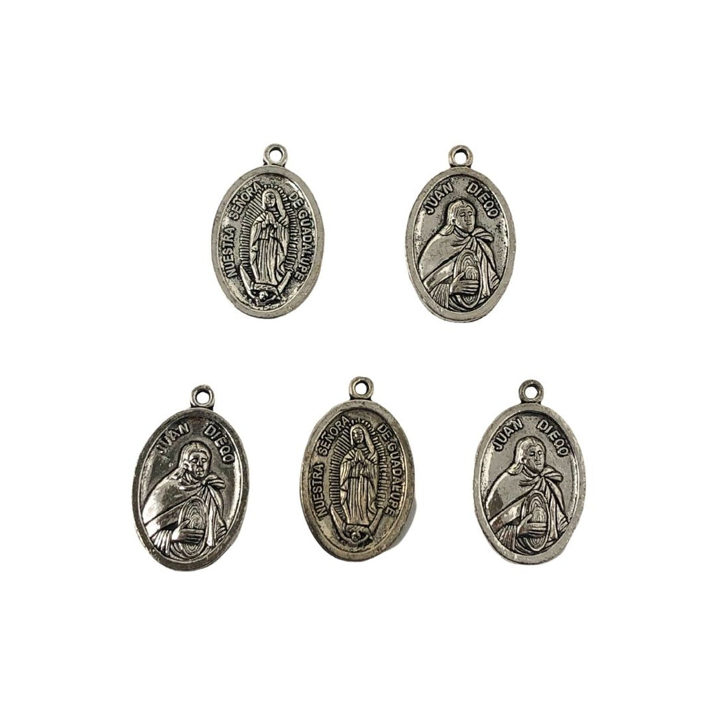 Dijes metalicos religiosos