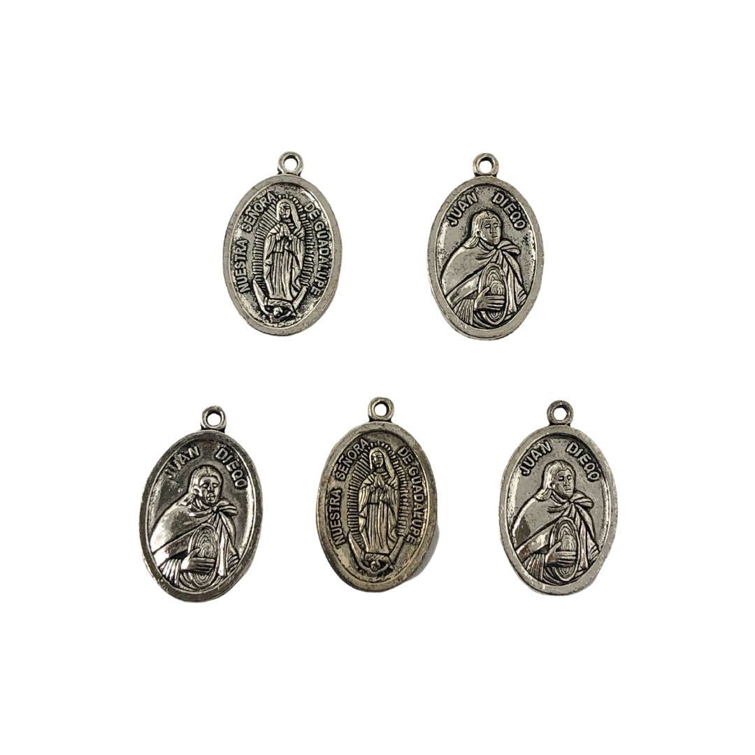Dijes metalicos religiosos