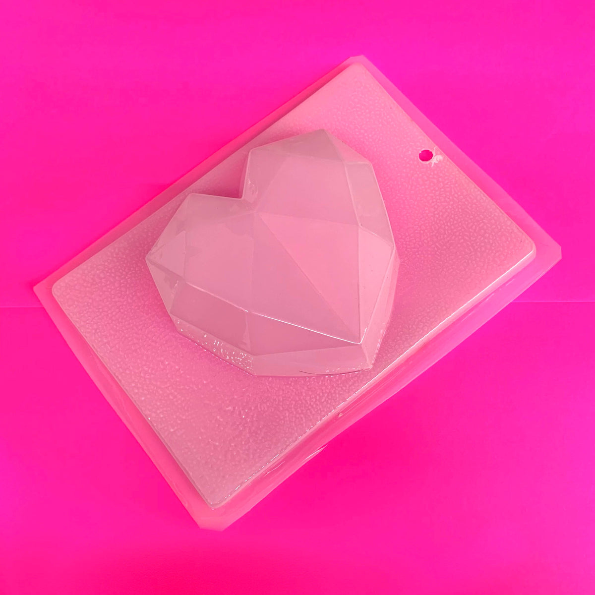 MOLDE PLASTICO DE CORAZON GEOMETRICO MEDIANO 17X17X3.5CM